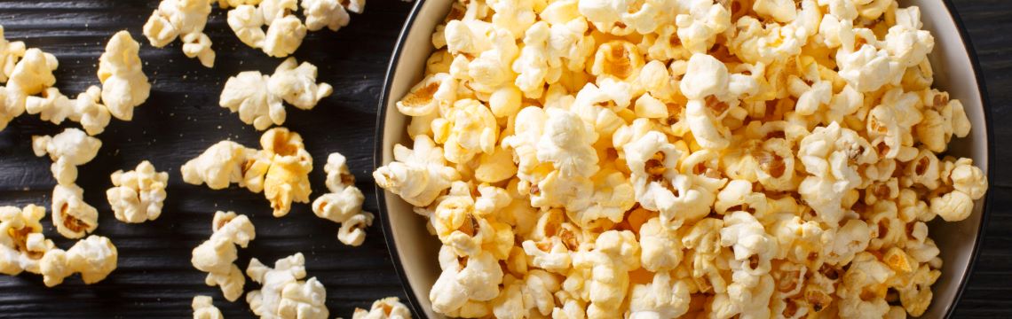 An overflowing bowl of popcorn.