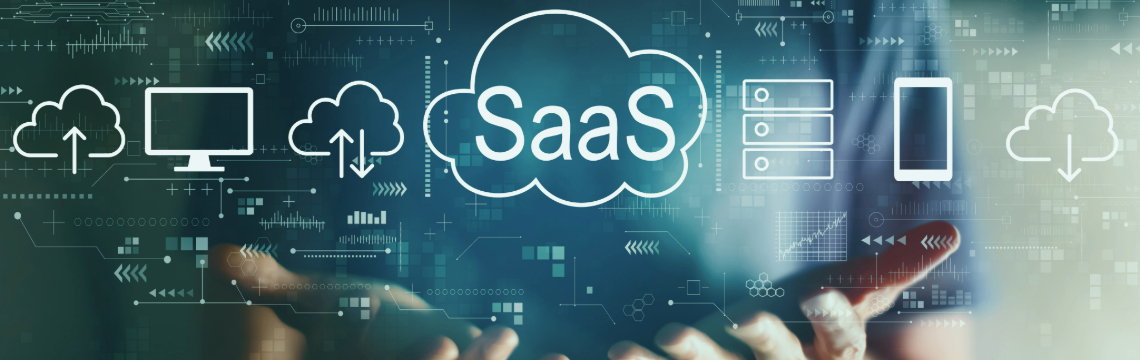 Person holding graphics depicting SaaS.