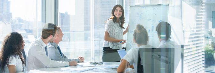 Woman giving a presentation in an office