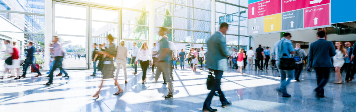 blurred people business at a trade fair